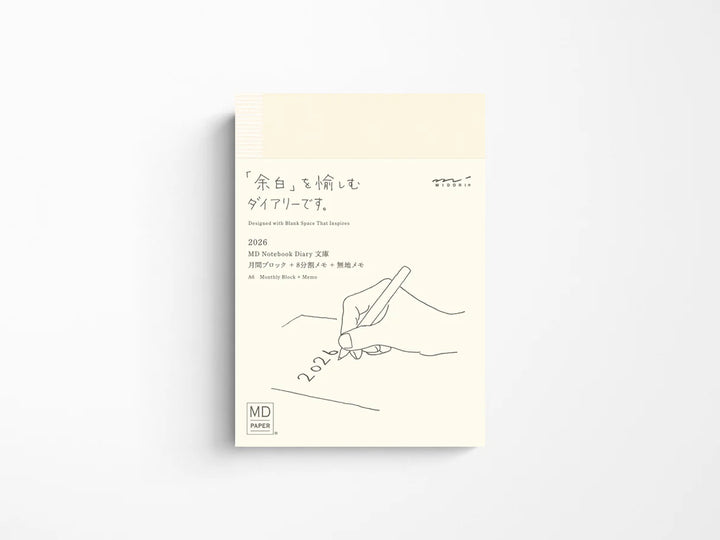 2026 MD Notebook Diary with a minimalist design of a hand holding a pen on a white background
