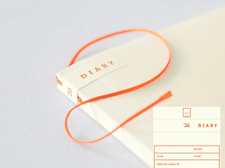 2026 Diary with orange string on a light gray background