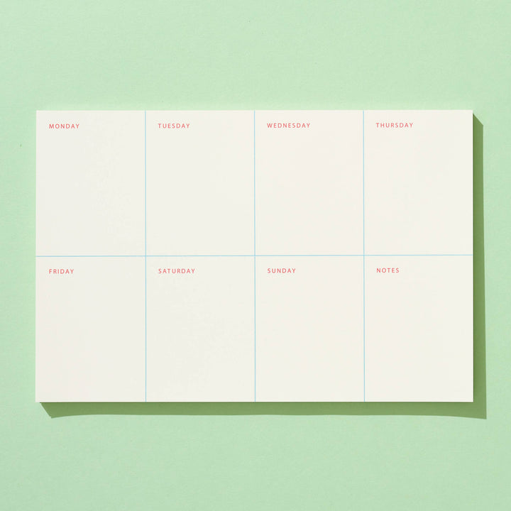Weekly planner sheet with days of the week on a light green background
