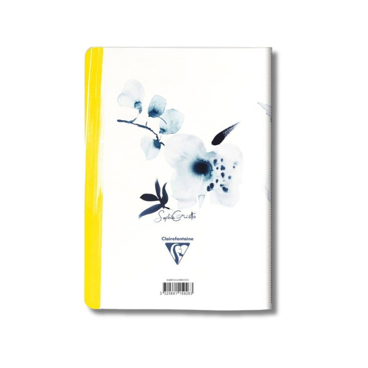 Notebook with floral design and yellow stripe on a white background.