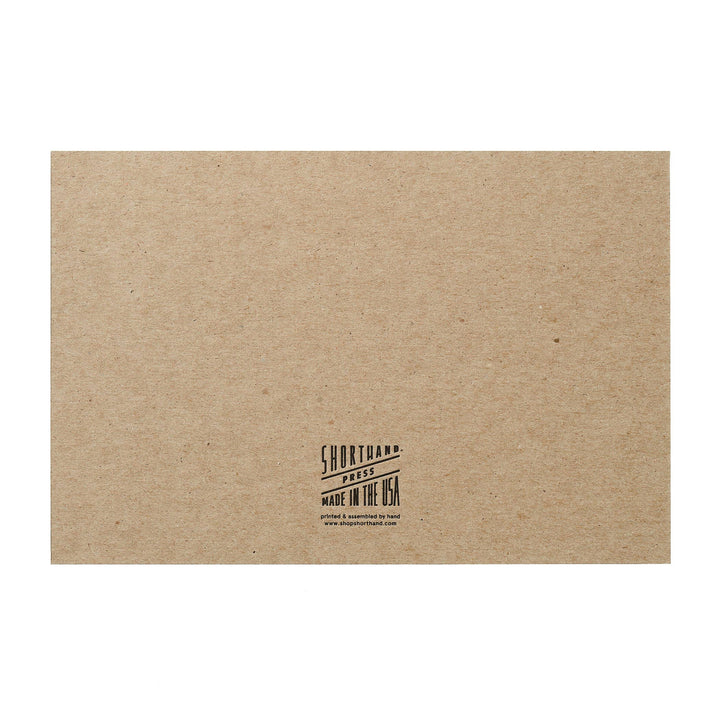 Kraft paper box with 'Shortland Shoes' logo and text on a white background