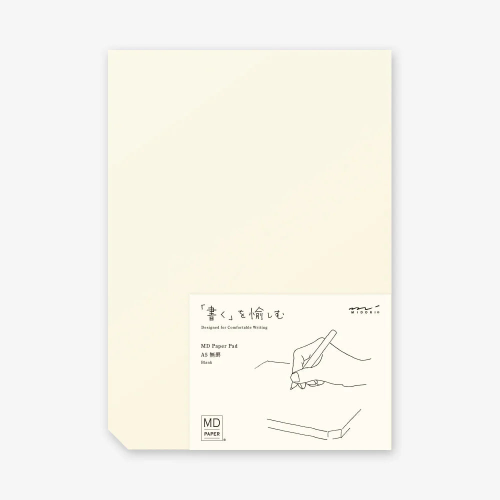 Beige paper pad with white label on a white background