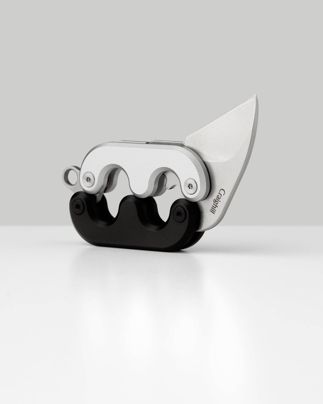 Knife  with a white blade on a light gray background