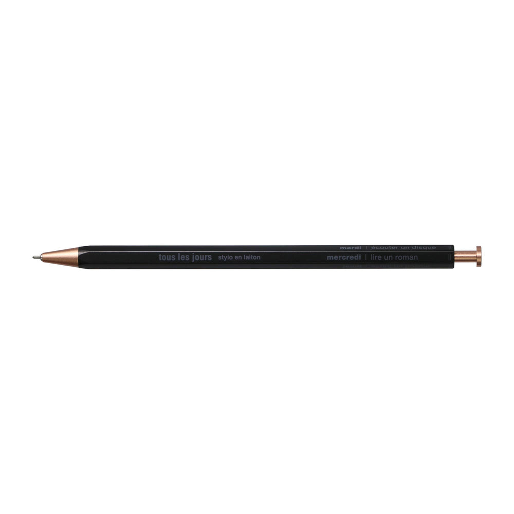 A selection of ballpoint pens with brass bodies, available in gold, silver, and rose gold colors, displayed alongside their packaging boxes.