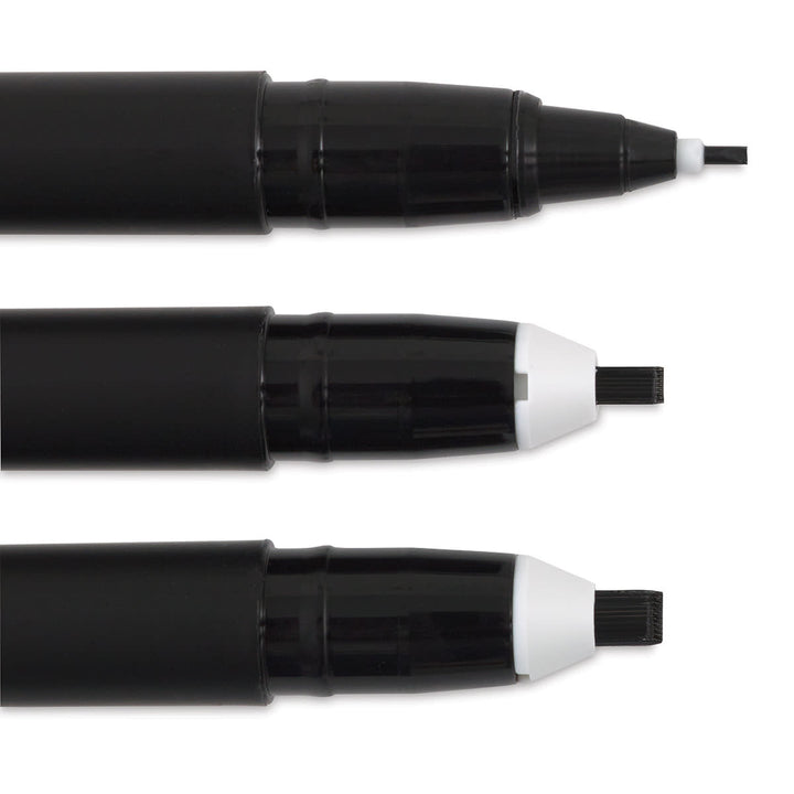 Three black markers on a white background