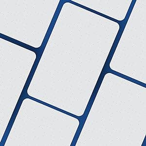 Close-up of a white cards on on a blue surface.