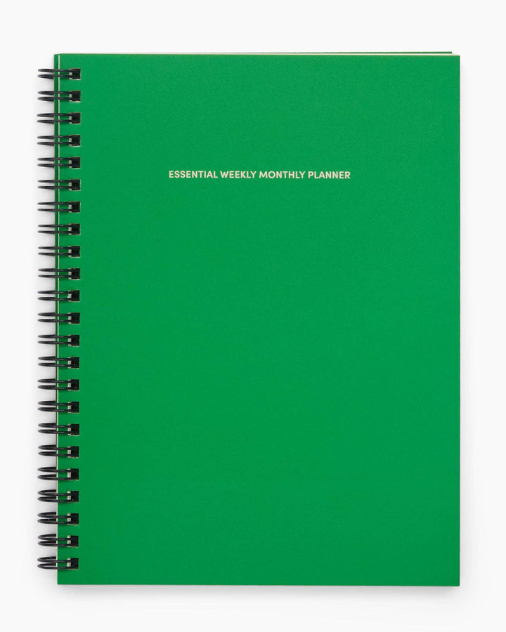 Green planner with 'Essential Weekly Monthly Planner' text on a white background