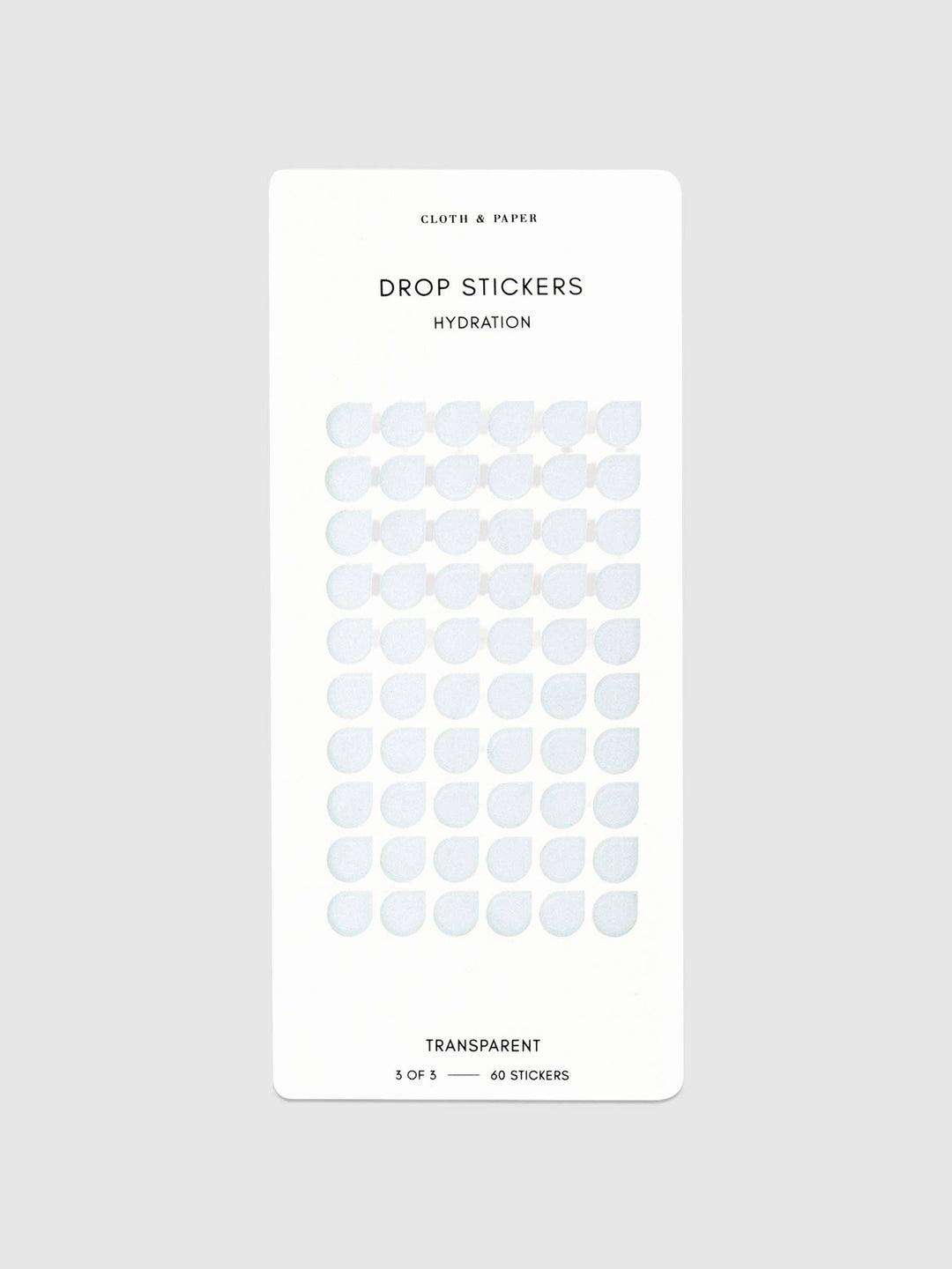 Sheet of transparent drop-shaped stickers on a white background