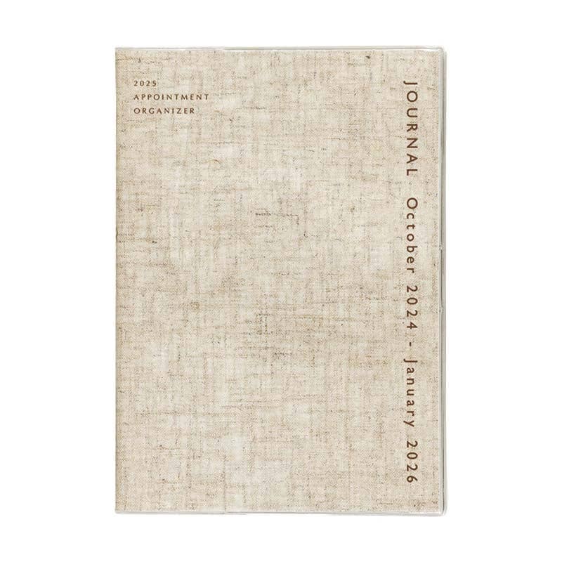Beige textured journal with tJournal October 2024 - January 2026 on a white background
