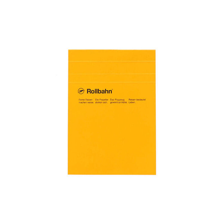 Yellow notebook with 'Rollibahn' branding on a white background