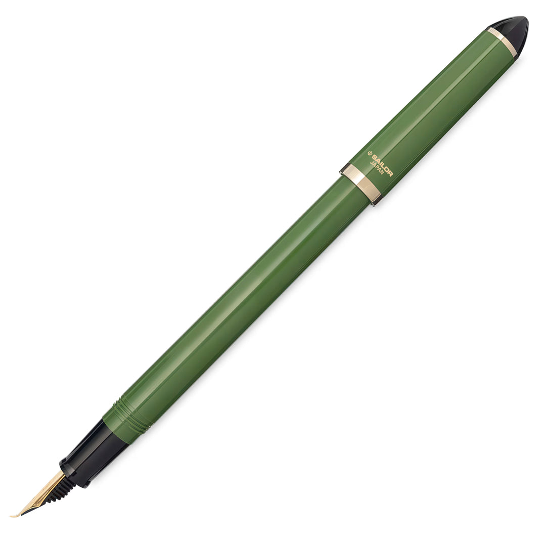 Green fountain pen on a white background