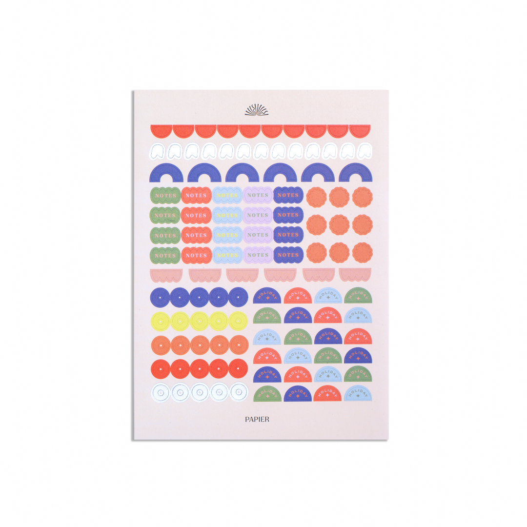 Packaging of colorful geometric stickers on a white background