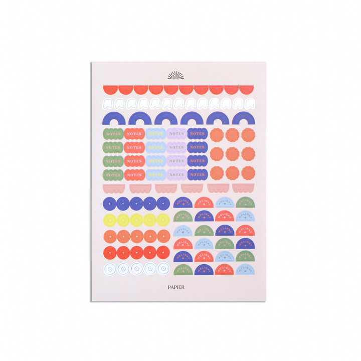 Packaging of colorful geometric stickers on a white background