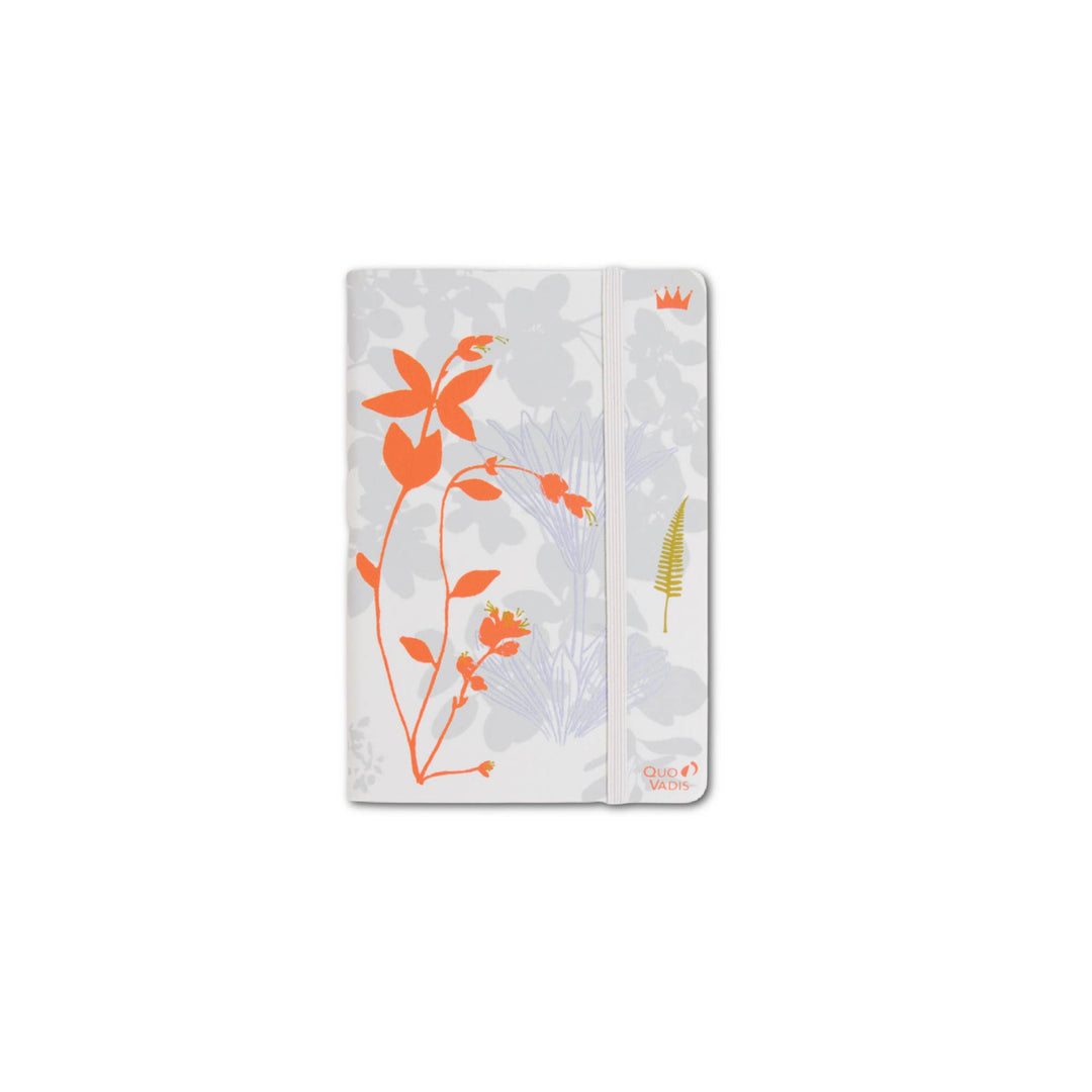 Notebook with floral design on a white background