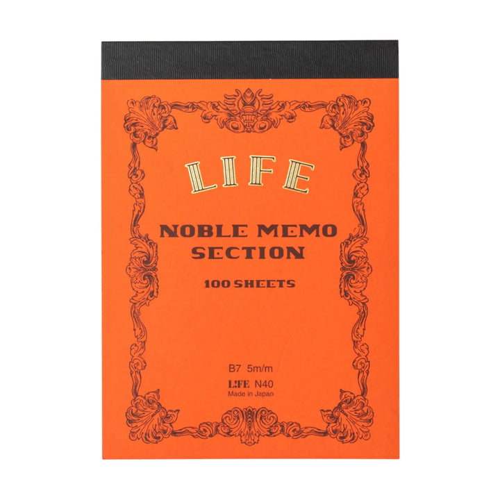 Orange notebook with decorative border and text on a white background.