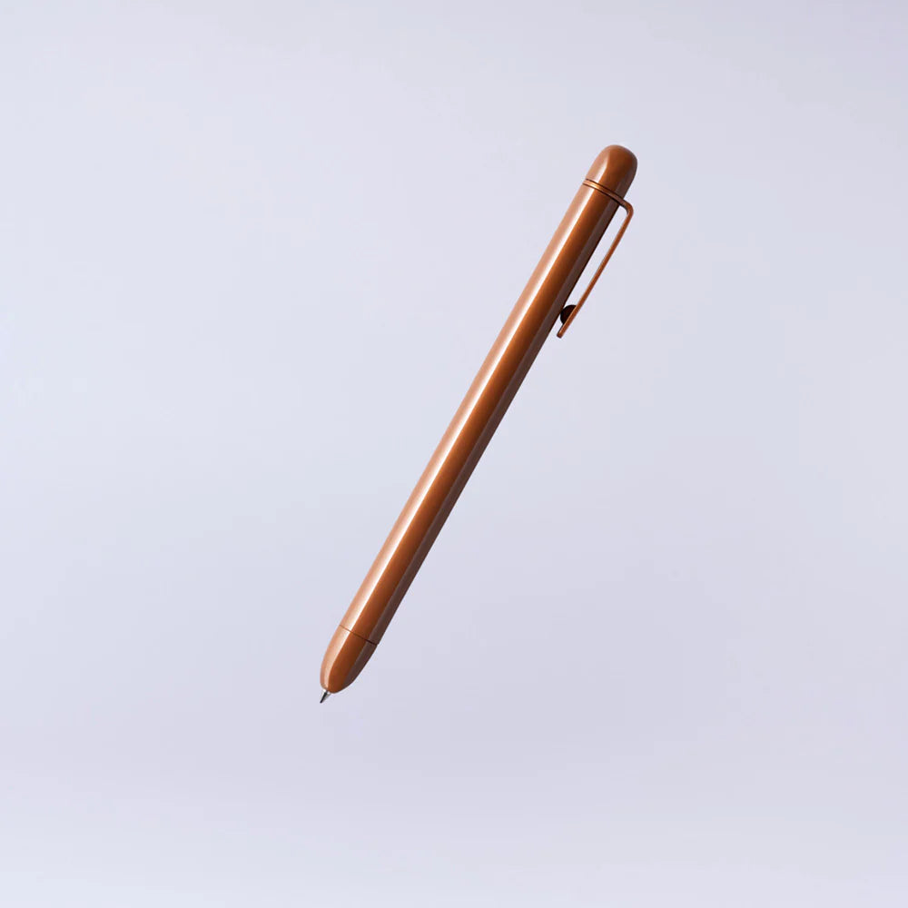 Camel metal pen on a light gray background