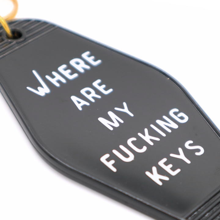 Keychain with text 'WHERE ARE MY FUCKING KEYS' on a white background