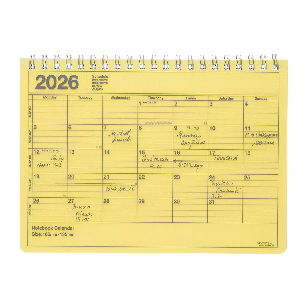 Yellow notebook calendar for 2026 with a white background