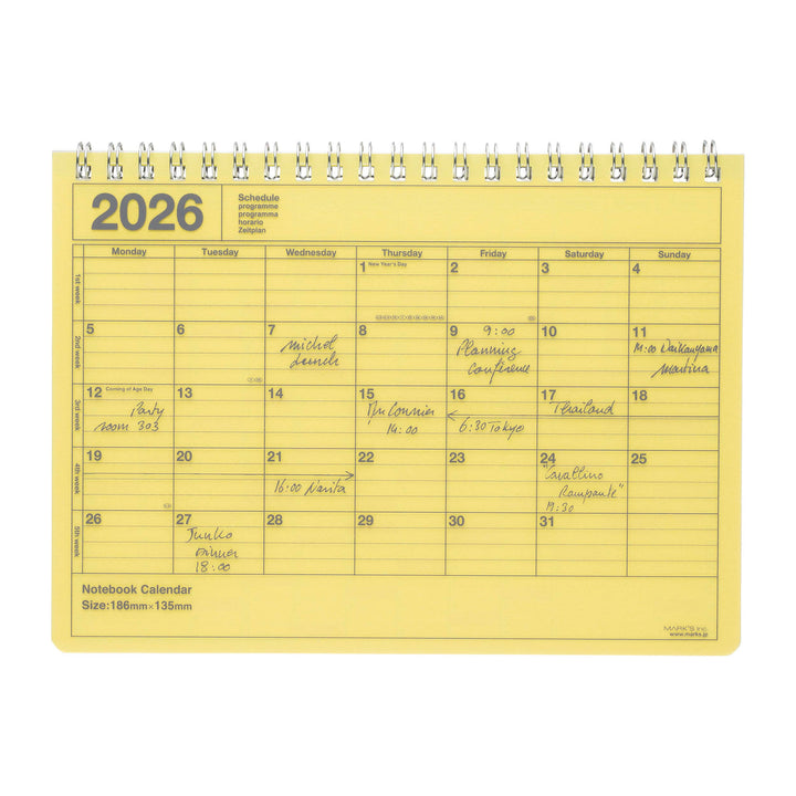 Yellow notebook calendar for 2026 with a white background