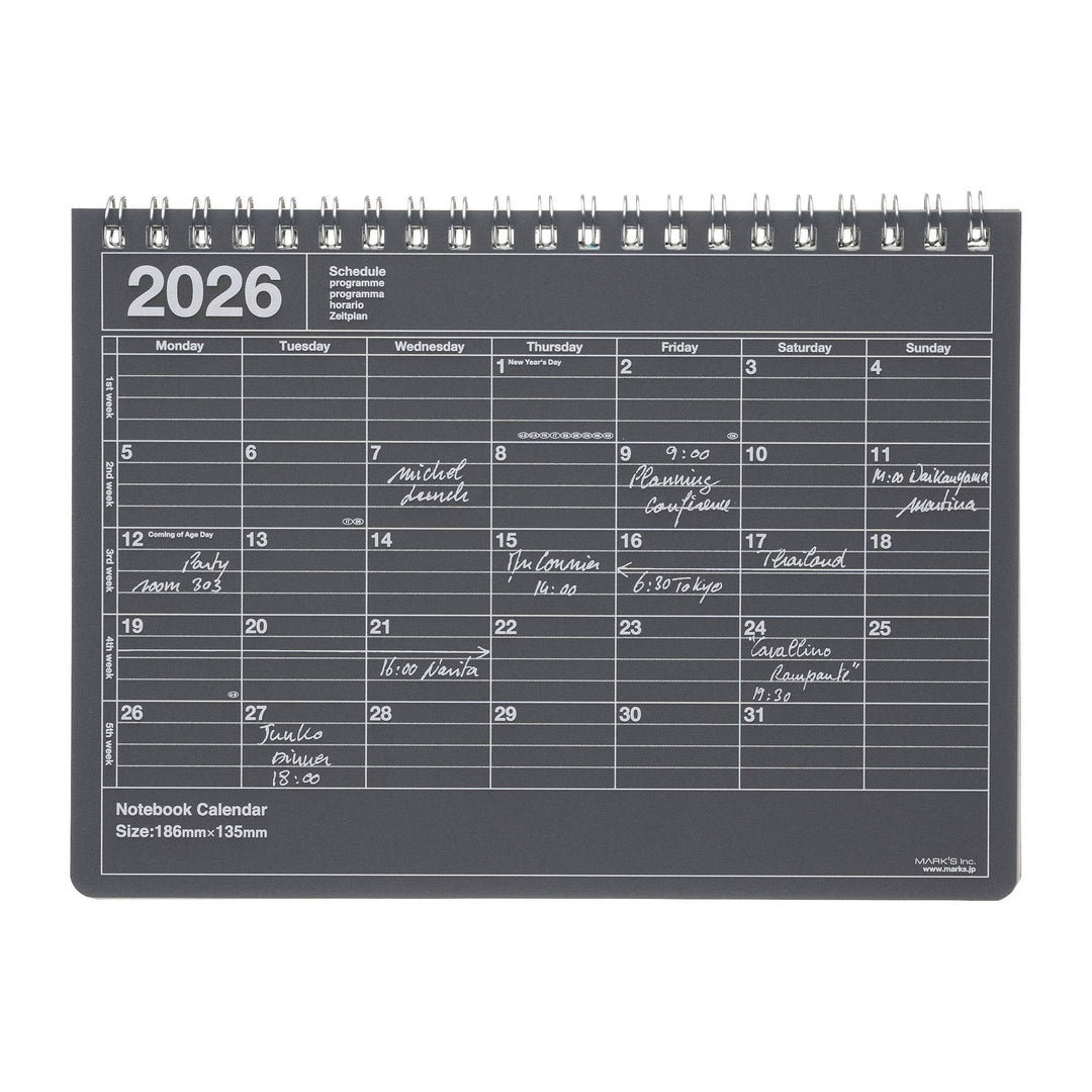 Black notebook calendar for 2026 with daily scheduling grid.