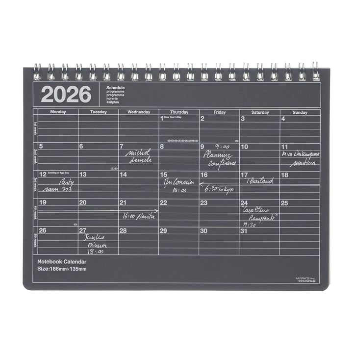 Black notebook calendar for 2026 with daily scheduling grid.