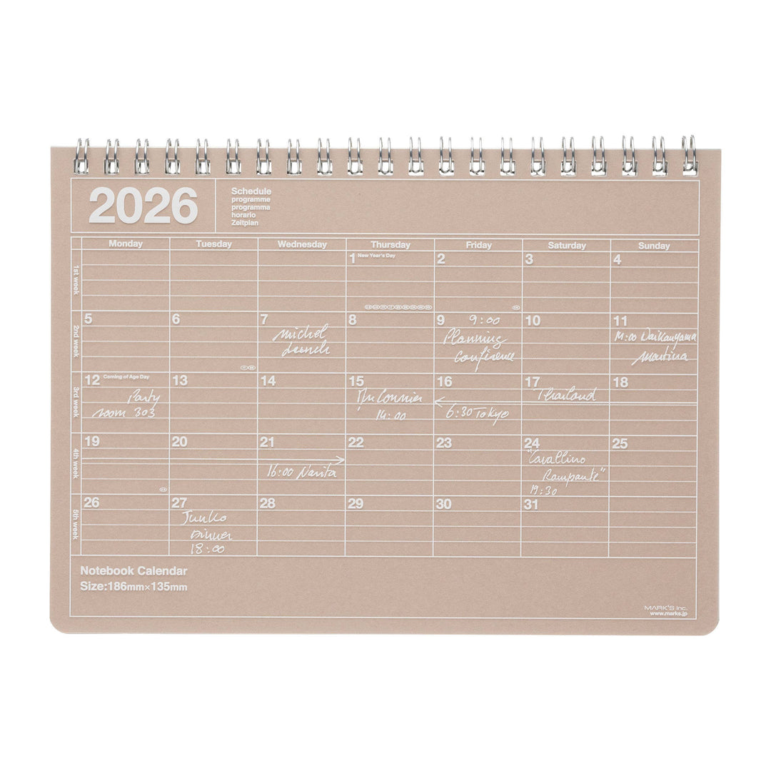 Beige notebook calendar for 2026 on a white background