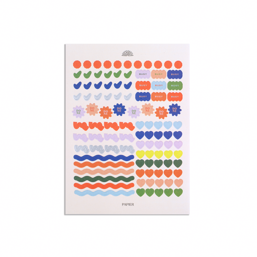 Sheet of colorful stickers with various designs on a white background
