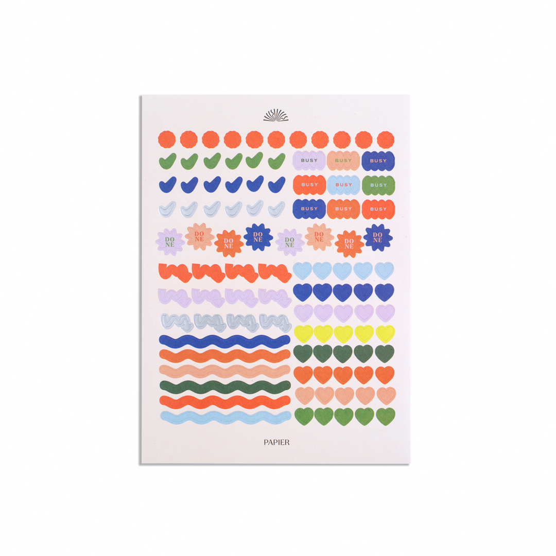Sheet of colorful stickers with various designs on a white background