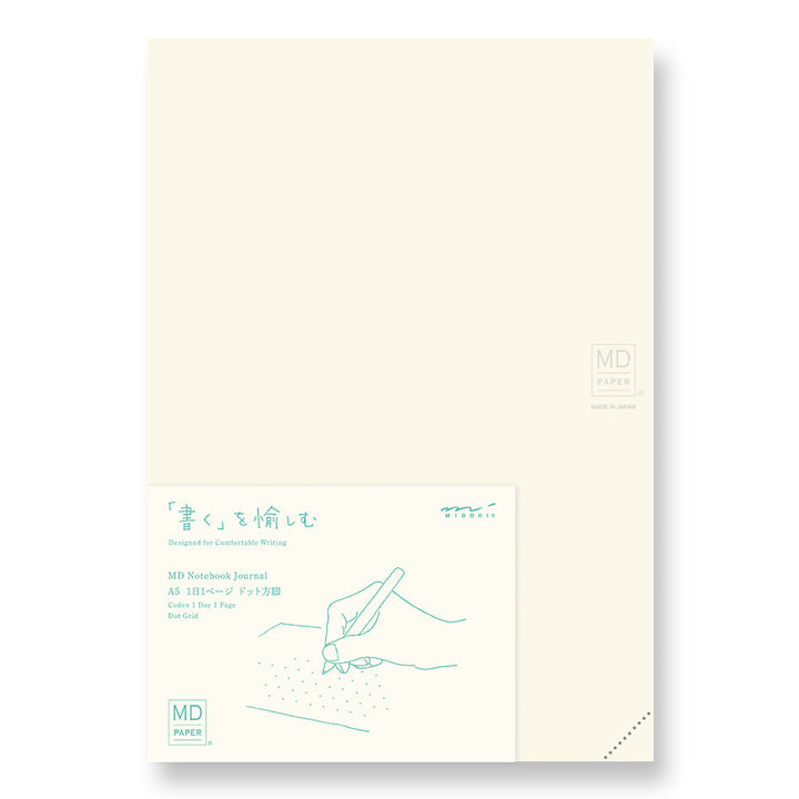white notebook with dotted lines.