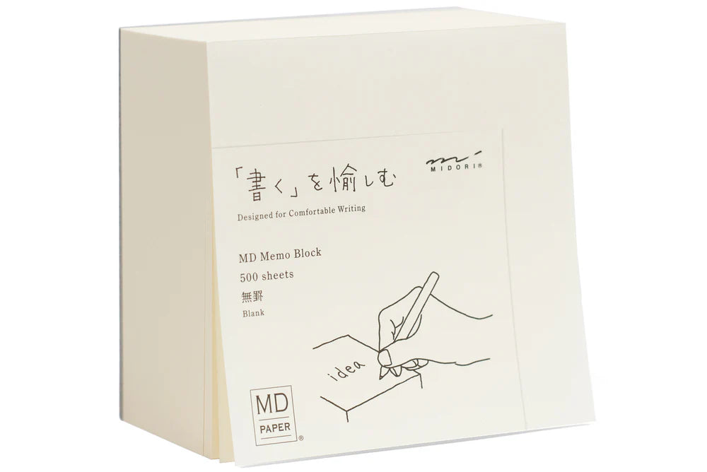 Box of MD Memo paper with minimalist design on a white background