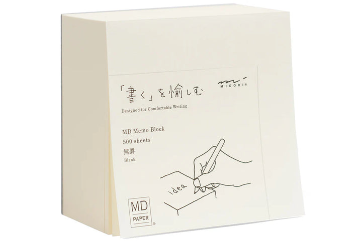 Box of MD Memo paper with minimalist design on a white background
