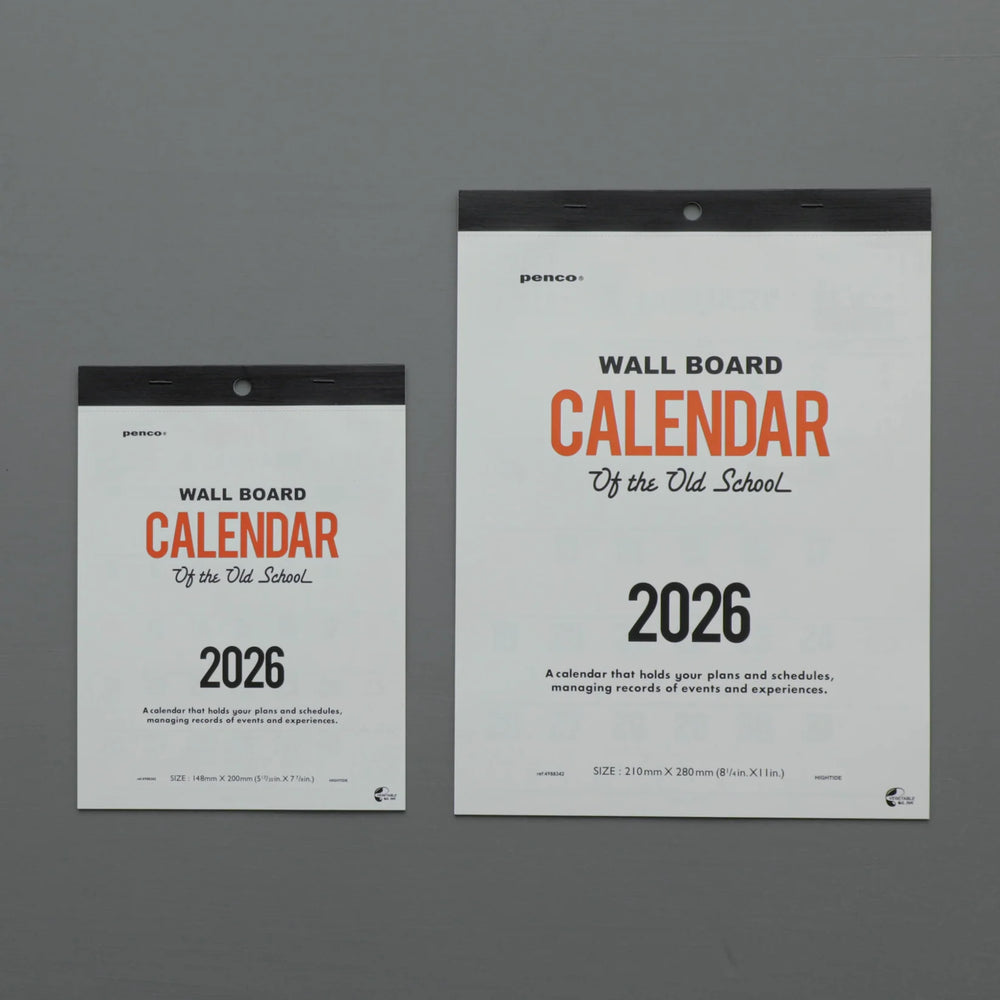 Two wall board calendars for 2026 on a gray background