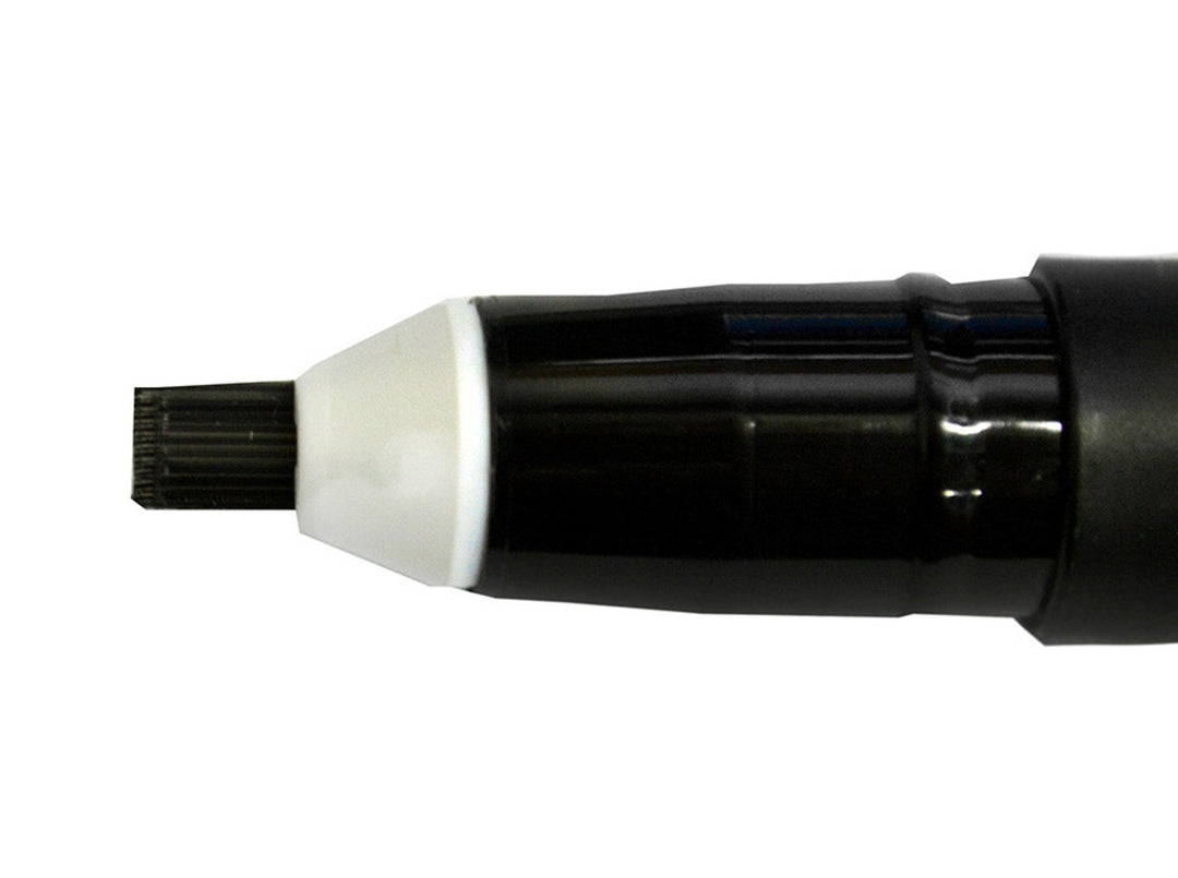 Black and white tattoo pen on a white background